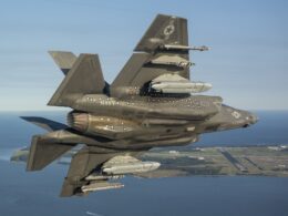 A US Navy F-35C fighter conducting a flight test with the LRASM missile