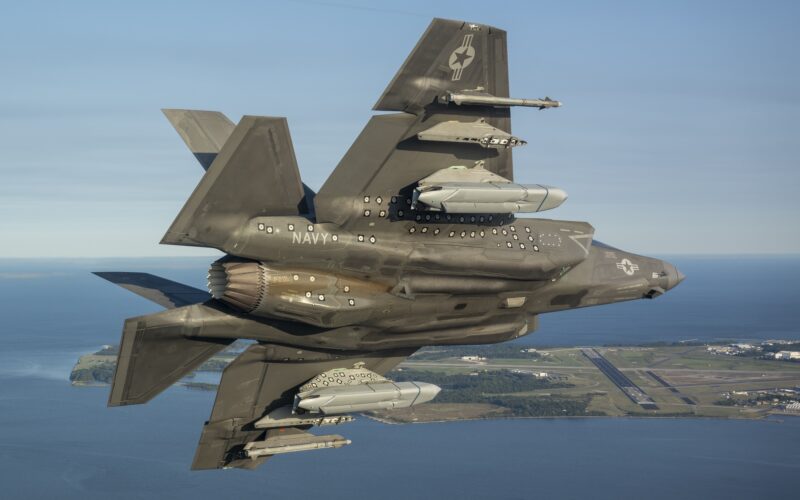 A US Navy F-35C fighter conducting a flight test with the LRASM missile