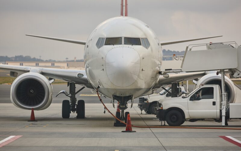 Airplane refueling on the runaway. Transportation industry. Fuel supply