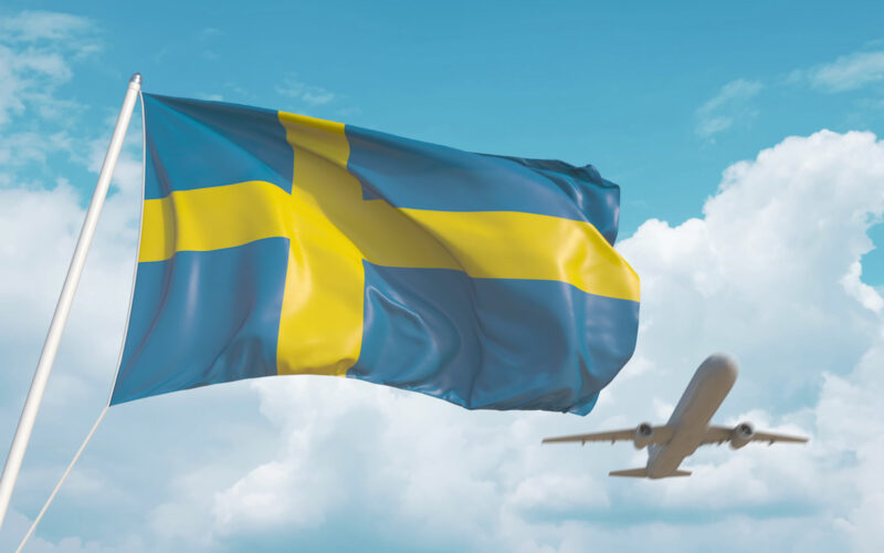 Airliner,Approaches,The,Swedish,Flag.,Tourism,In,Sweden.,3d,Rendering