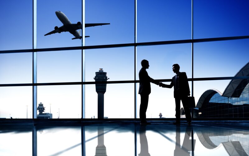 Business people meeting at an airport