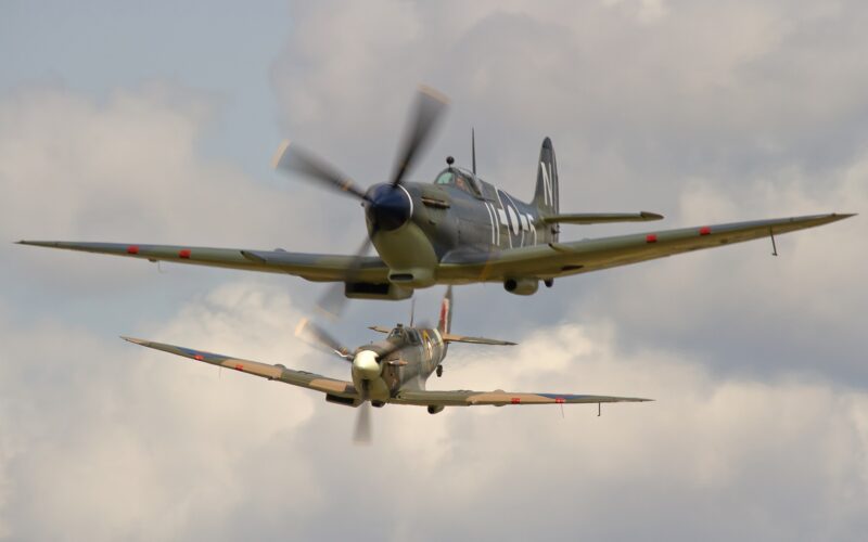 Supermarine Spitfire Mk Vb BM597 JH C G MKVB closes in on Asian Supermarine Spitfire Mk LF III PP972 G BUAR