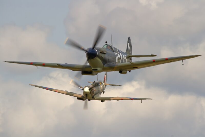 Supermarine Spitfire Mk Vb BM597 JH C G MKVB closes in on Asian Supermarine Spitfire Mk LF III PP972 G BUAR