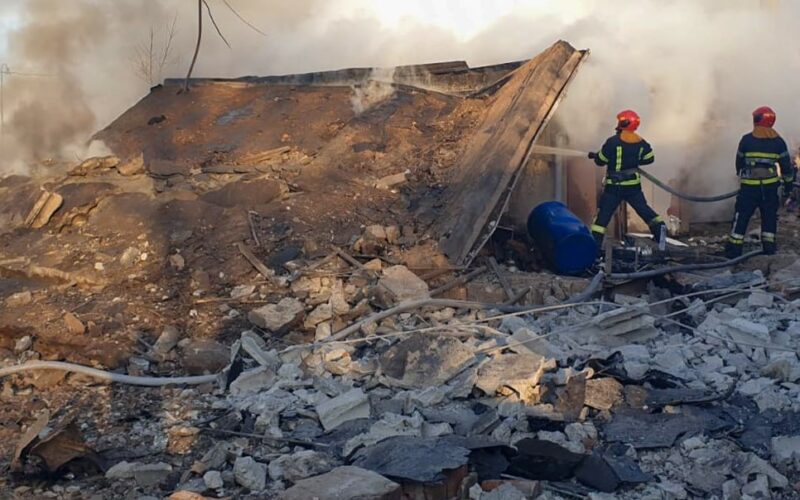 Ukrainian firefighters extinguishing a fire