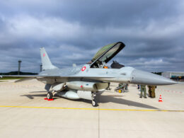 A Danish F-16 fighter jet parked on an air base