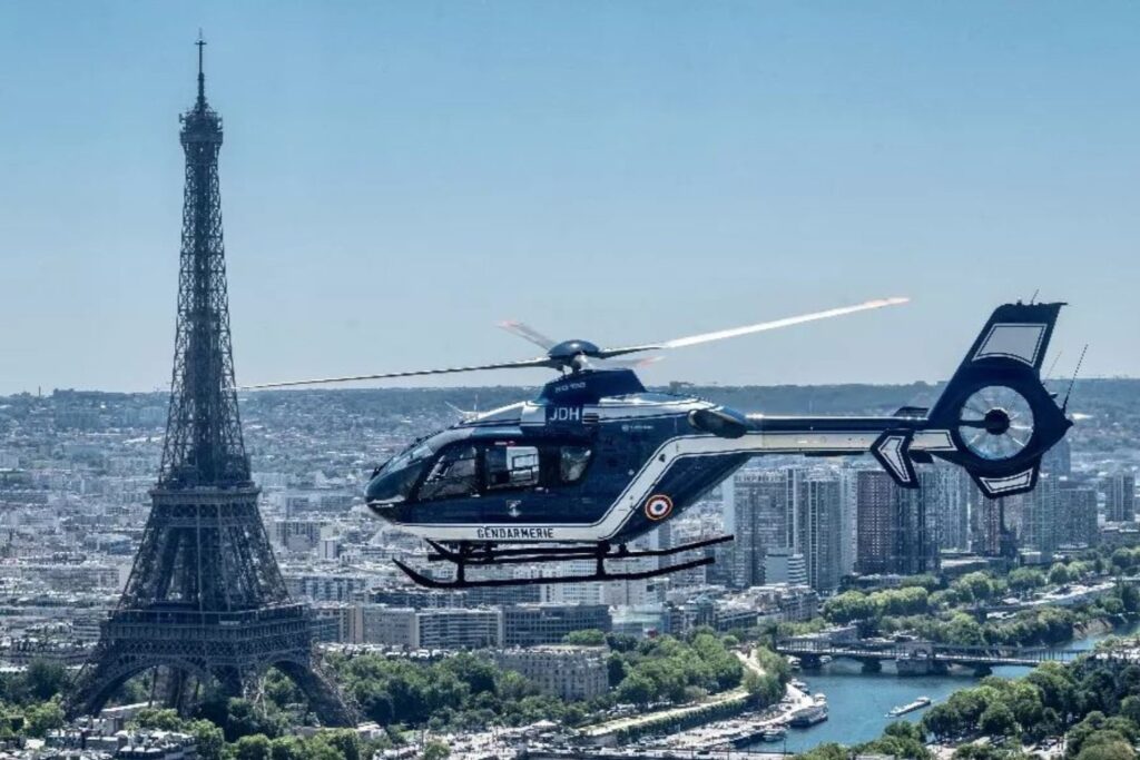 A Gendarmerie H145 helicopter near the Eiffel Tower