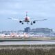 British Airways Airbus A320 landing at London Gatwick Airport LGW with multiple British Airways and easyJet aircraft in the background