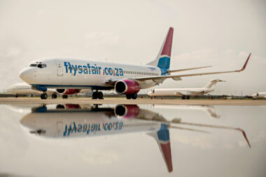 FlySafair B737 800 ZsSJS Water Reflection