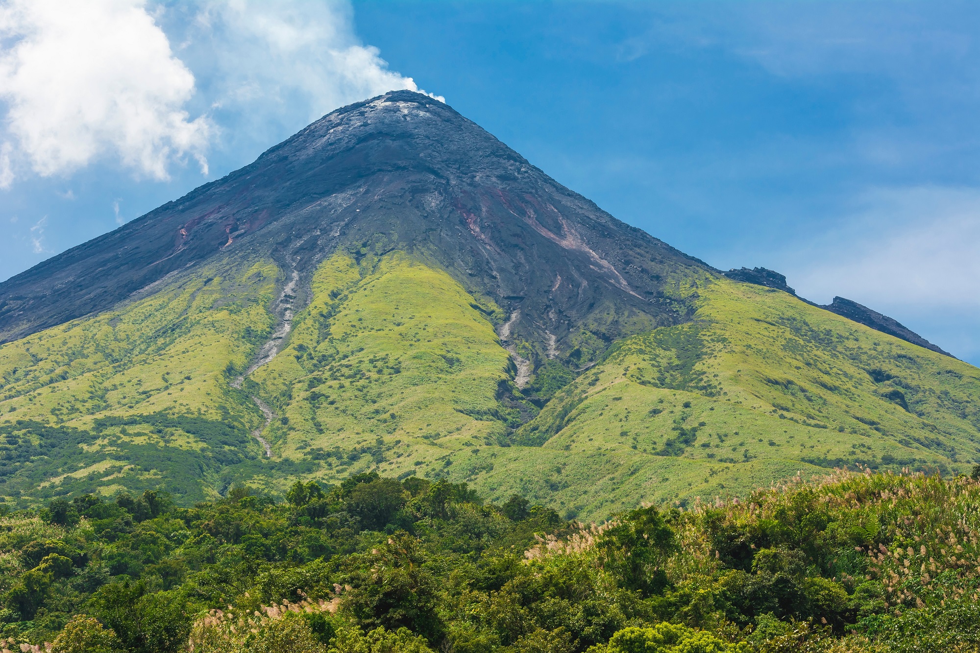 Four bodies found on Philippine volcano after Cessna crash.