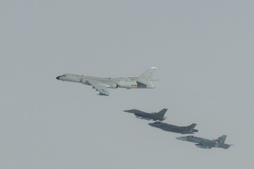 NORAD fighters intercepting a Chinese H-6 strategic bomber