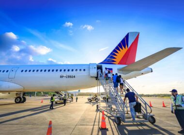 Passengers boarding Philippine Airlines plane