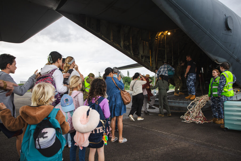 Royal Australian Air Force C-130 evacuating citizen from New Caledonia