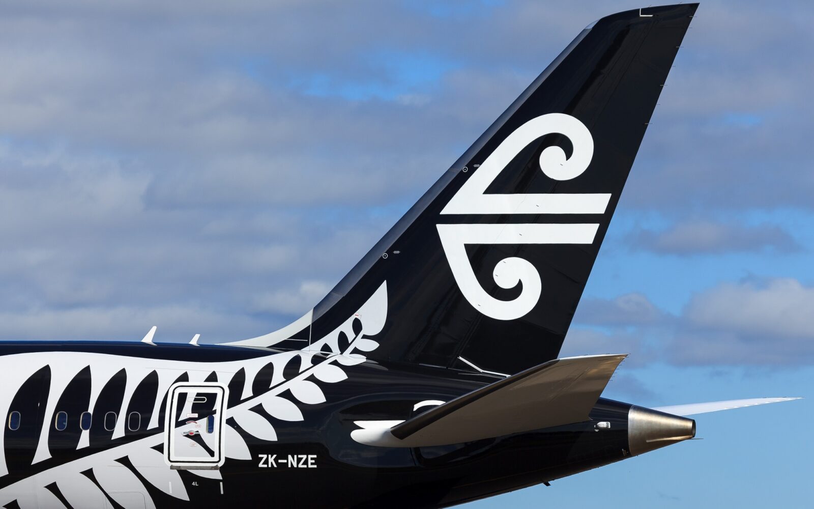 Air New Zealand Expects Unprecedented Demand To Normalize In FY2024   Tail Of An Air New Zealand Aircraft At Sydney Airport SYD 1600x1000 