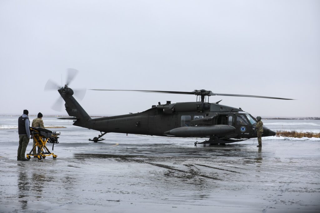 US National Guard UH-60L Black Hawk helicopter picking up patient