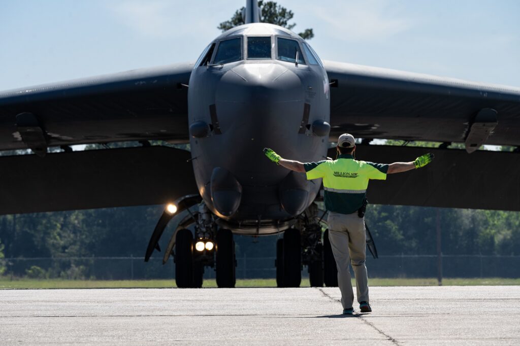 USAF B-52H Stratofortress strategic bomber arriving in civilian airport