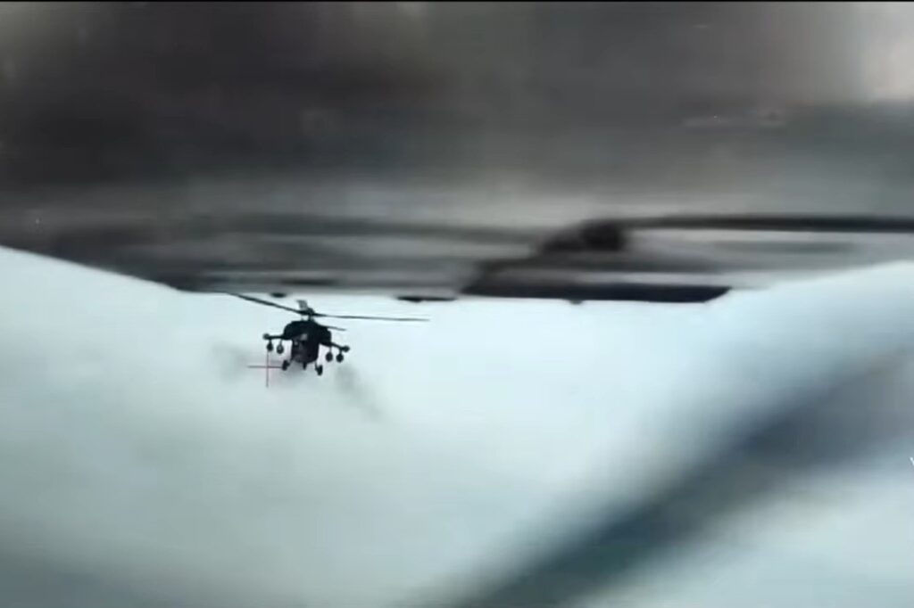 Ukrainian UAV evading a Mi-28 attack helicopter