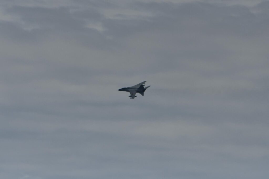 Xi'an JH-7 Flounder two-seater ground attack aircraft harassing Dutch frigate