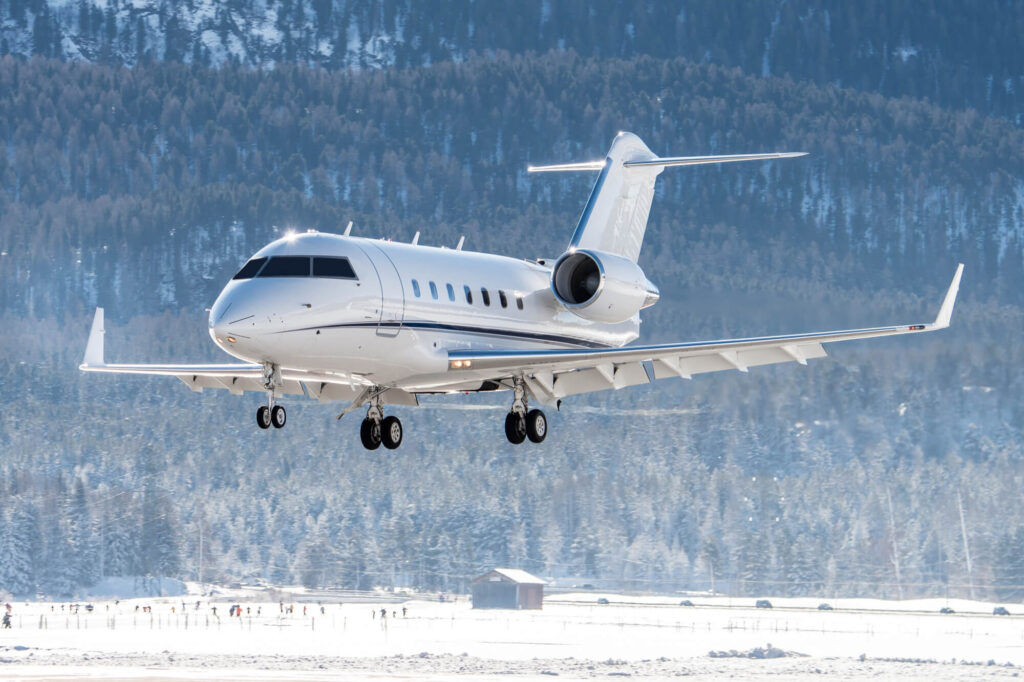 a_business_jet_landing_in_the_snowy_mountains-1.jpg