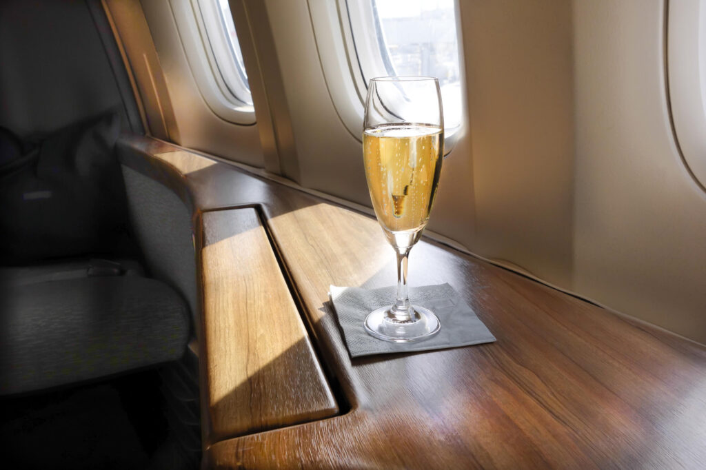 a_glass_of_champagne_in_a_private_plane_cabin.jpg