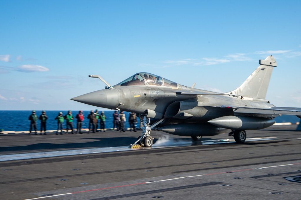 a_rafale_marine_of_the_french_navy_about_to_take_off_from_a_us_navy_carrier.jpg