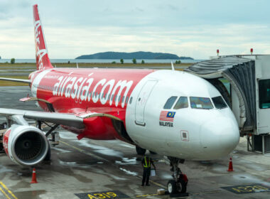 airasia_airbus_a320_family_aircraft_parked_in_kota_kinabalu_international_airport.jpg