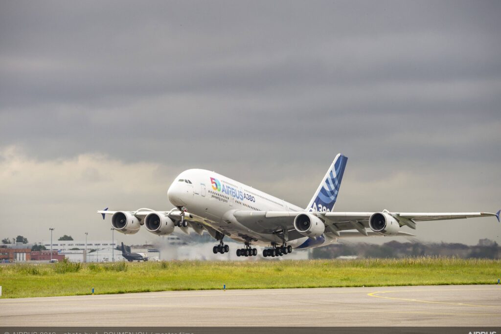 airbus_50th_anniversary_-_formation_flight_-_a380_taking_off.jpg