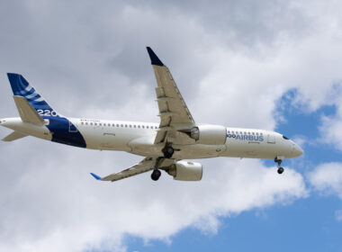 airbus_a220__landing_at_toulouse_blagnac_airport_tls_in_airbus_test_livery.jpg