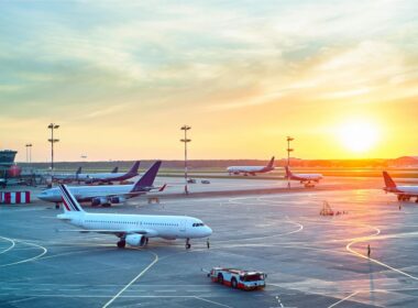 airport_with_many_airplanes_at_beautiful_sunset.jpg