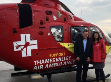 amanda_and_richard_next_to__air_ambulance_helicopter_1.jpg