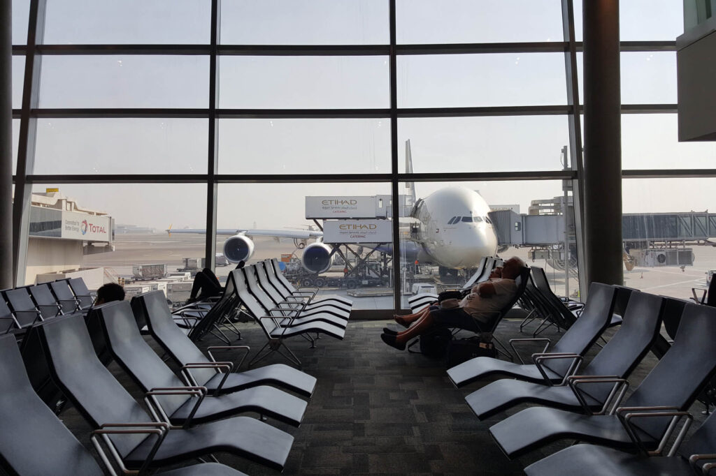 empty_airport_with_etihad_a380_in_the_background.jpg