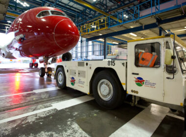 norwegian_air_shuttle_boeing_787_dreamliner_tugged_to_a_maintenance_hangar.jpg