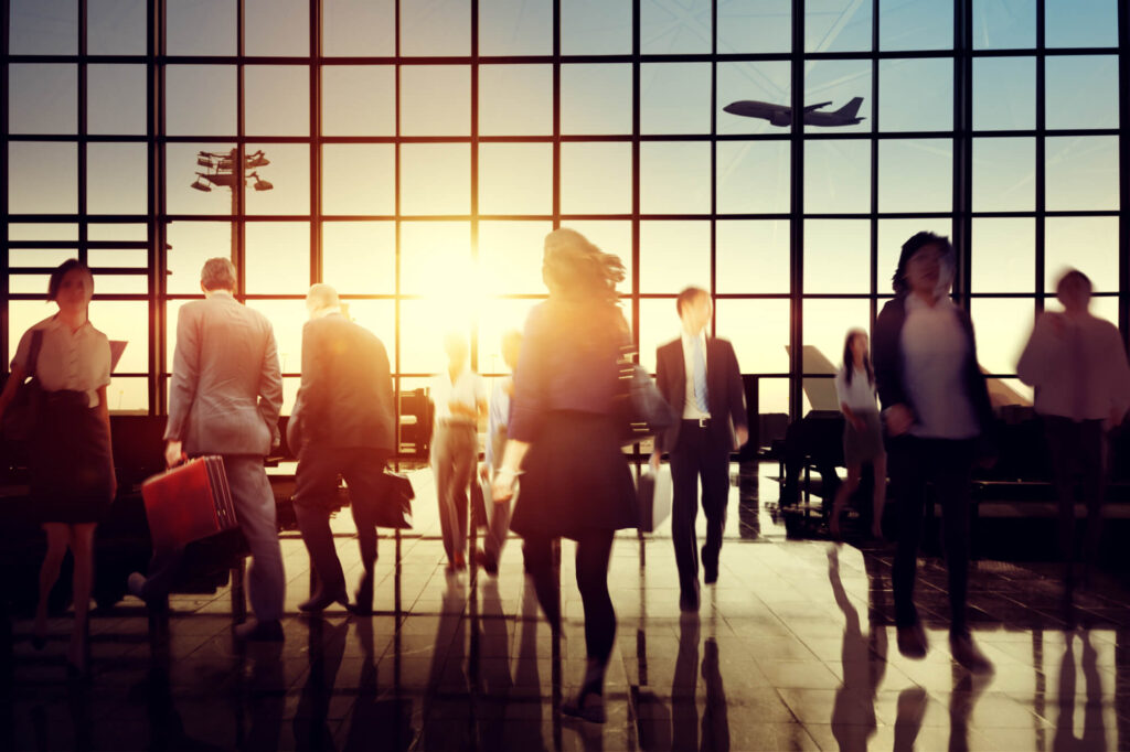 passengers_at_an_airport_against_the_sun.jpg