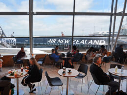 passengers_wait_to_fly_at_auckland_airport.jpg