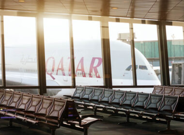 qatar_airways_airbus_a380_parked_at_doha_international_airport_gate-1.jpg