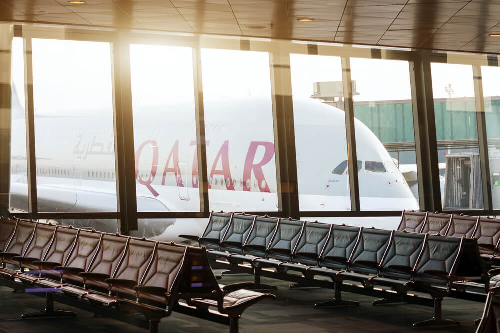 qatar_airways_airbus_a380_parked_at_doha_international_airport_gate-2.jpg