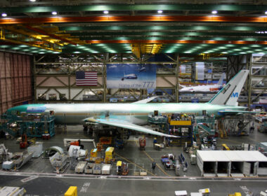 Boeing employees continue work building a Boeing 777 jets