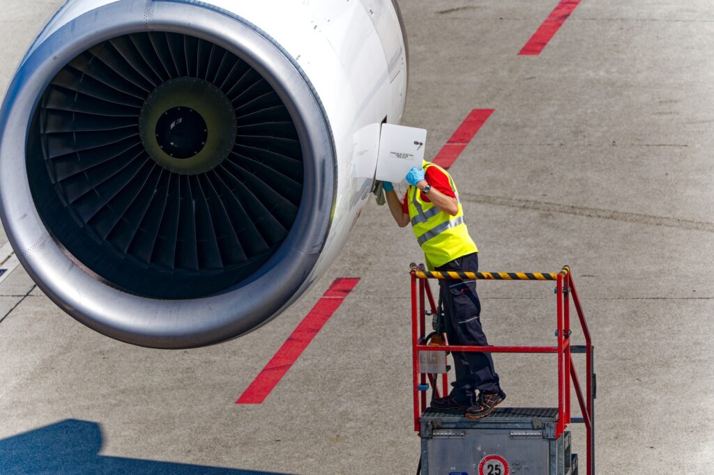 Airport technician doing maintenance  work