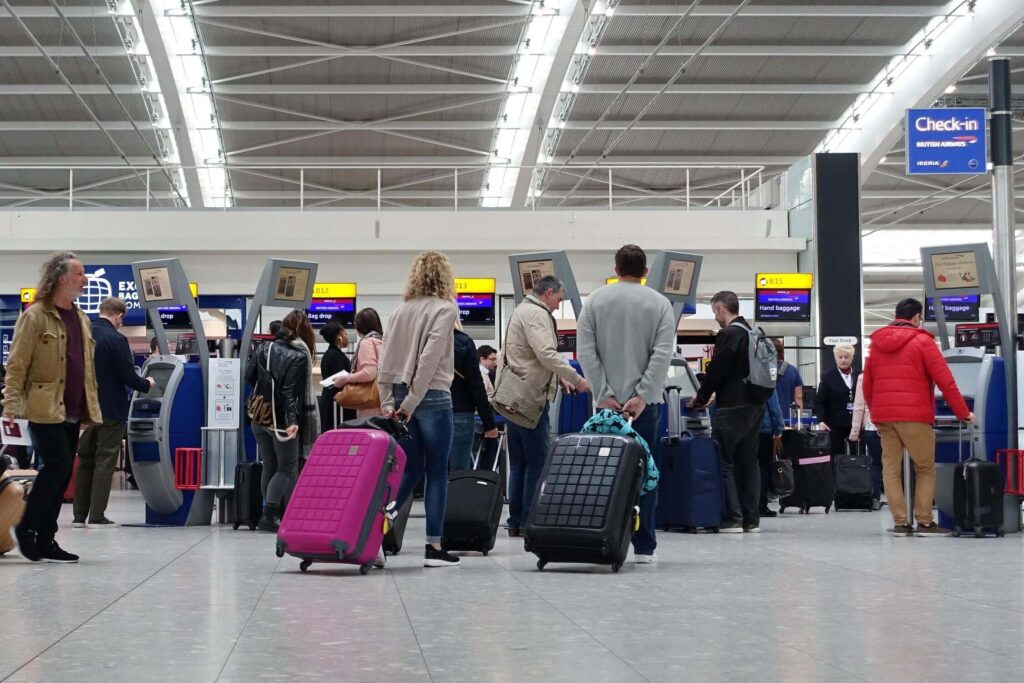 travellers_at_a_check_in_at_heathrow_airport_1.jpg