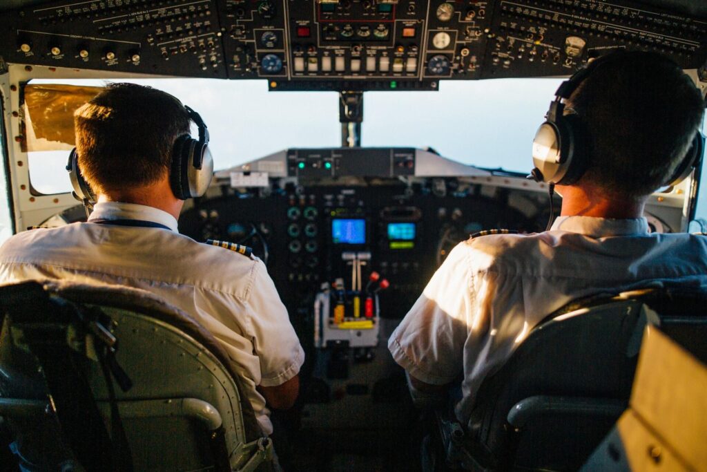 two-pilots-flying-an-airplane-2898316-2.jpg