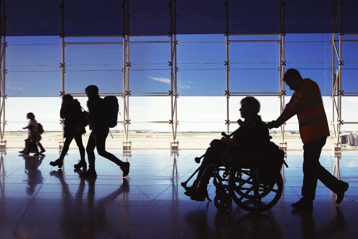 Silhouette of man in wheelchair