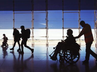 Silhouette of man in wheelchair